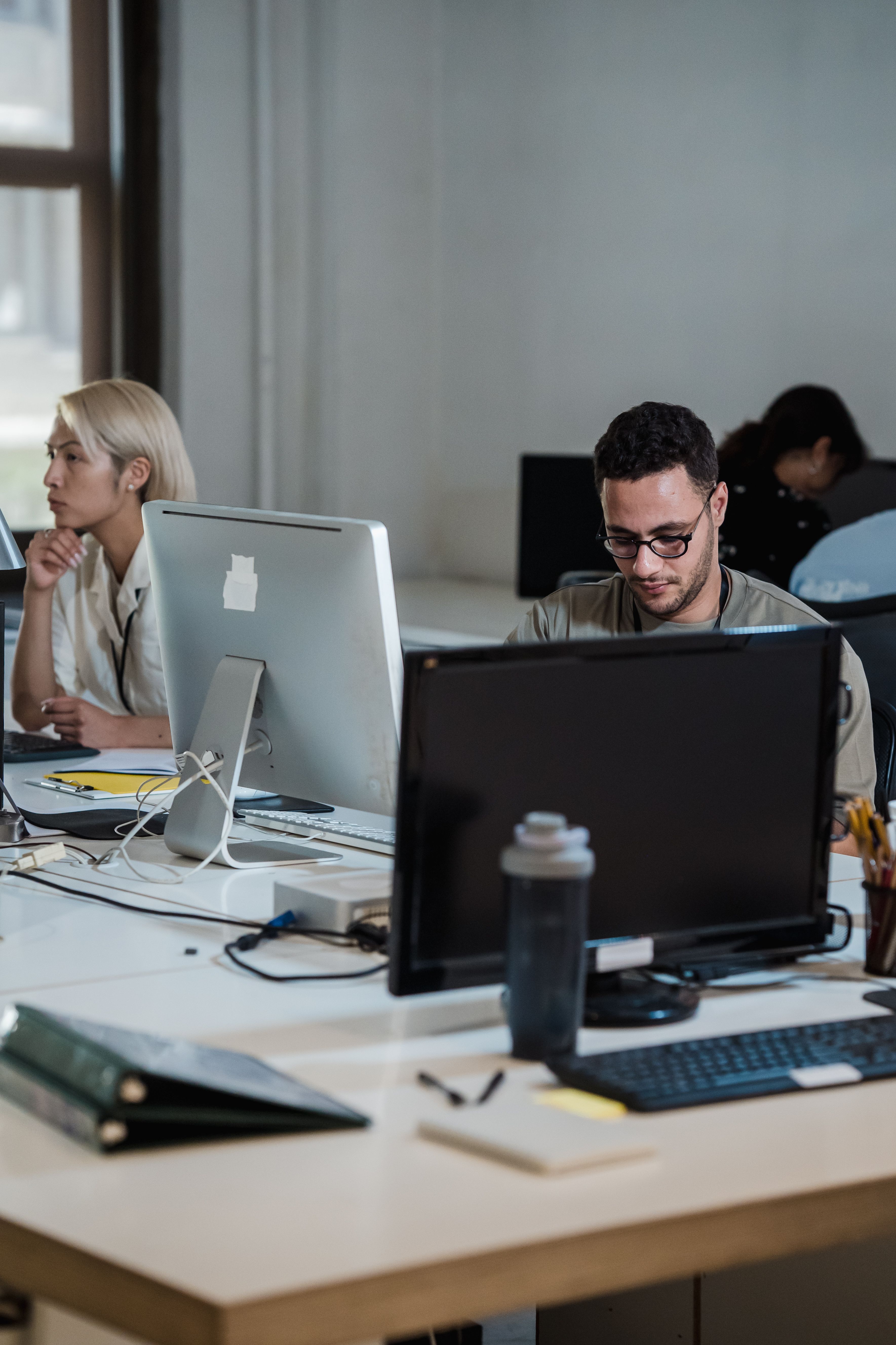 IT professional working at a modern tech workspace